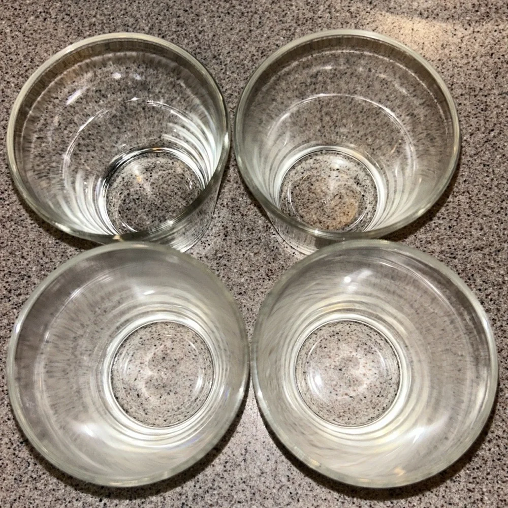 Four small water bottles